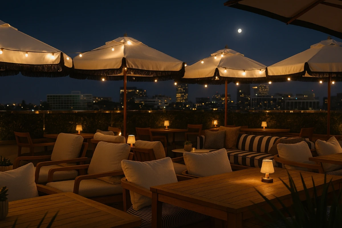 Elegant rooftop terrace dining area with city lights background