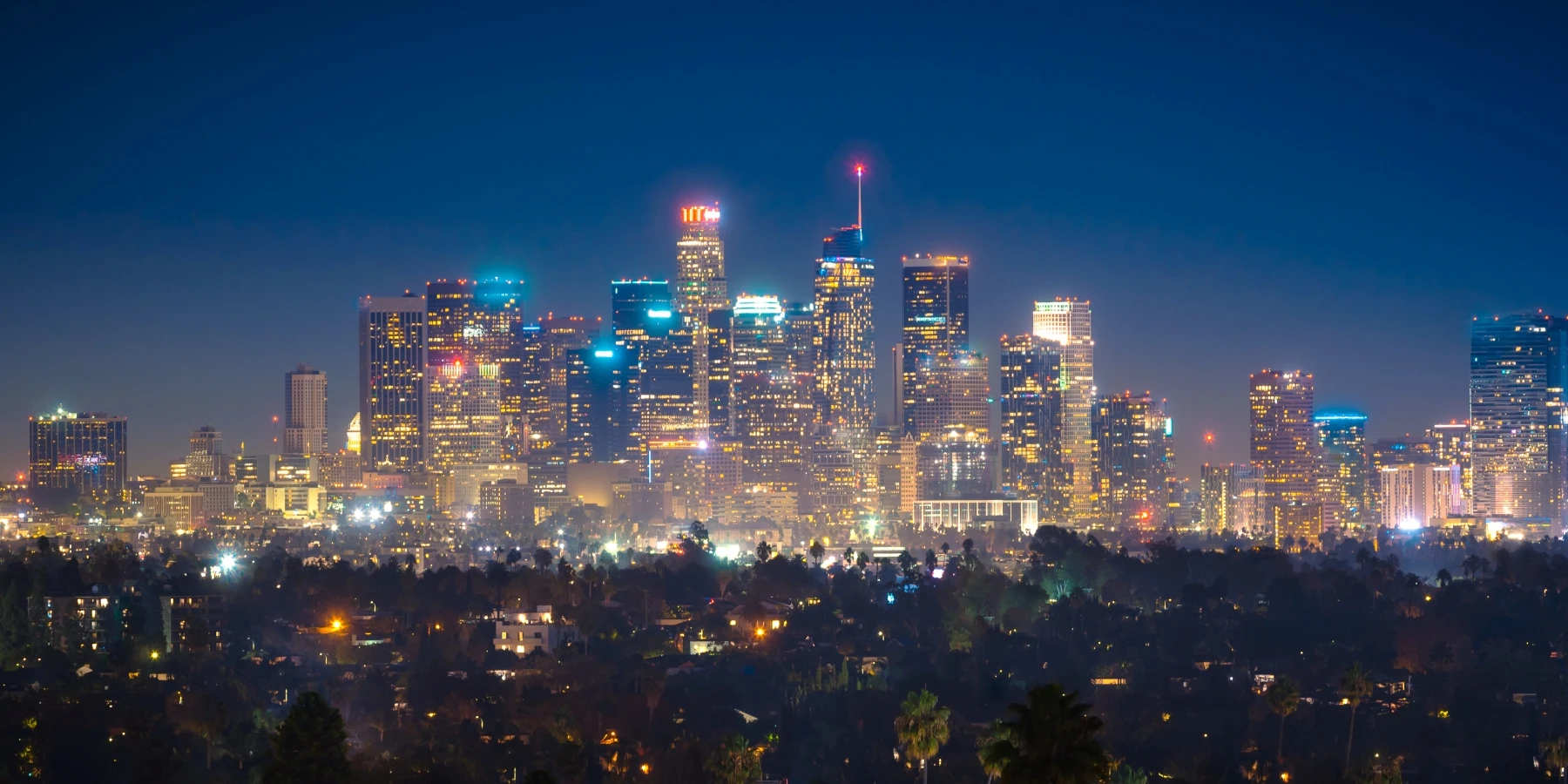 Los Angeles downtown skyline at night with illuminated skyscrapers