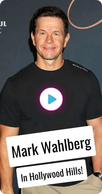 Mark Wahlberg posing at the awards