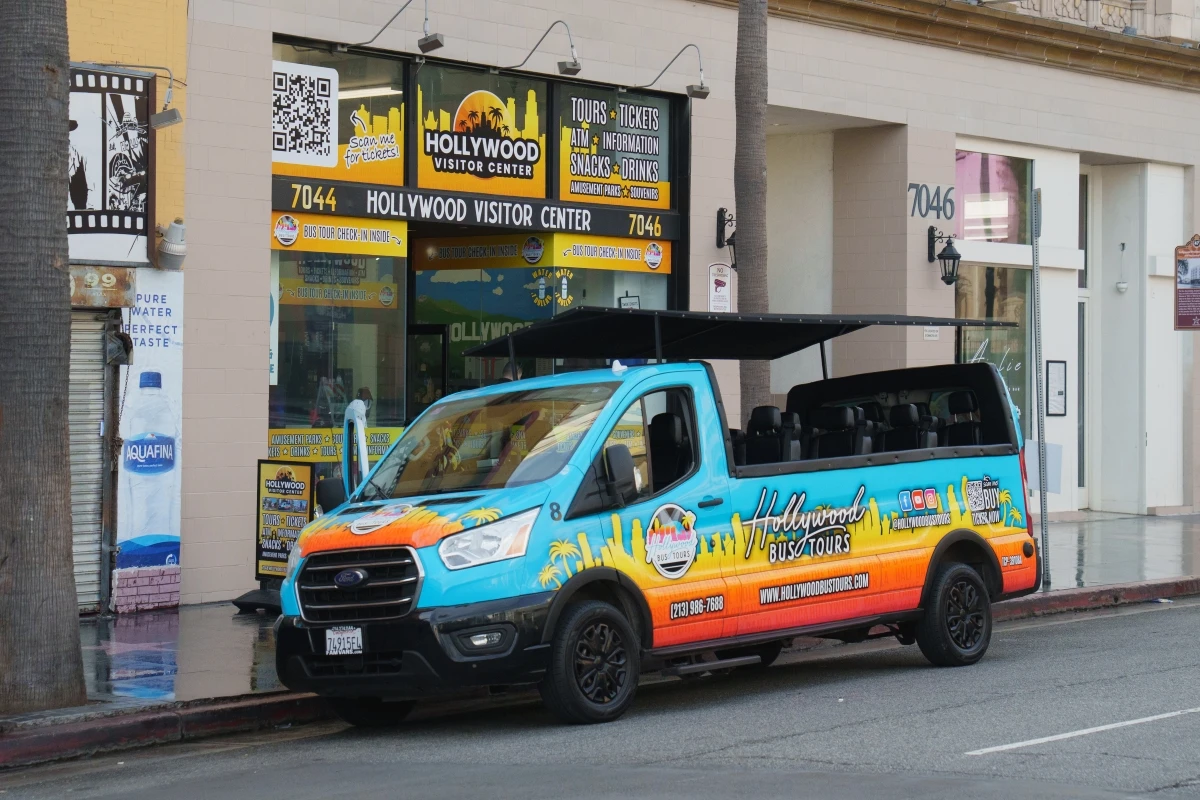 Colorful Hollywood Bus Tours vehicle parked at Hollywood Visitor Center