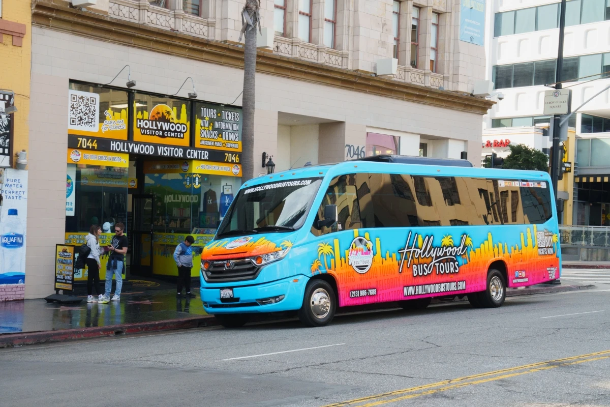 Hollywood Bus Tours colorful tour bus on Hollywood Boulevard street
