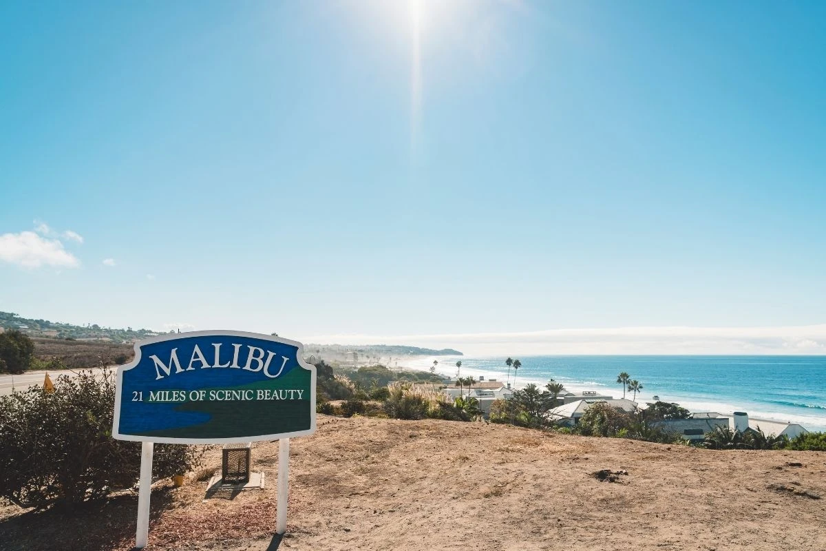 Malibu sign overlooking Pacific Ocean coastline and scenic beaches