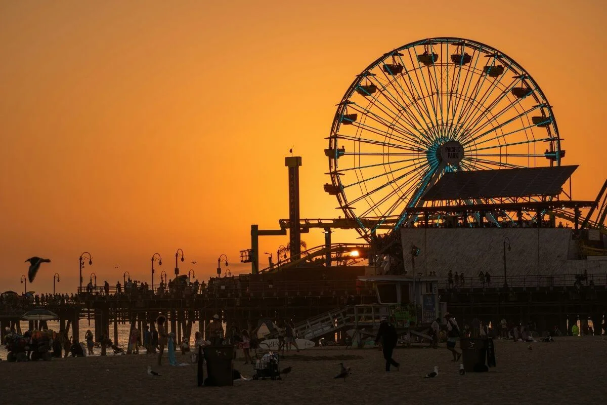 Ferris wheel silhouette at Santa Monica Pier during sunset