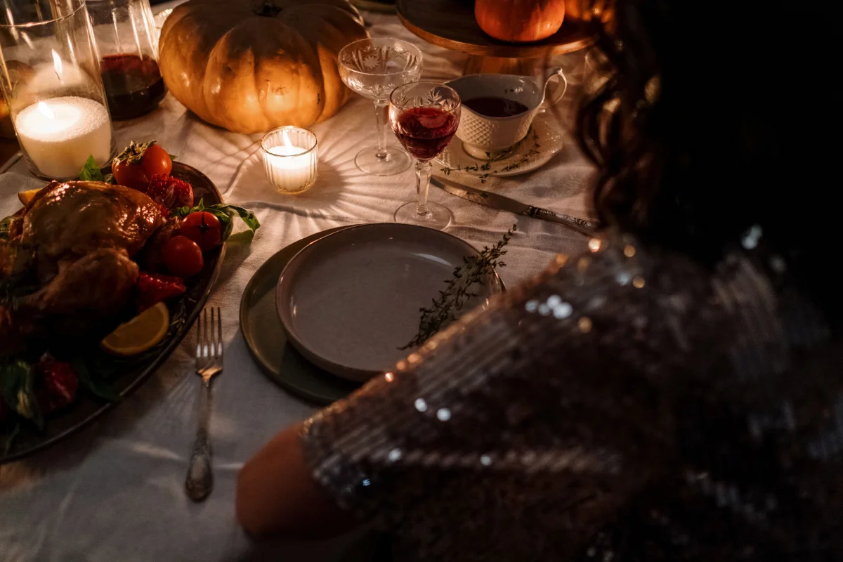 Autumn dinner table with pumpkins and candlelight in Los Angeles