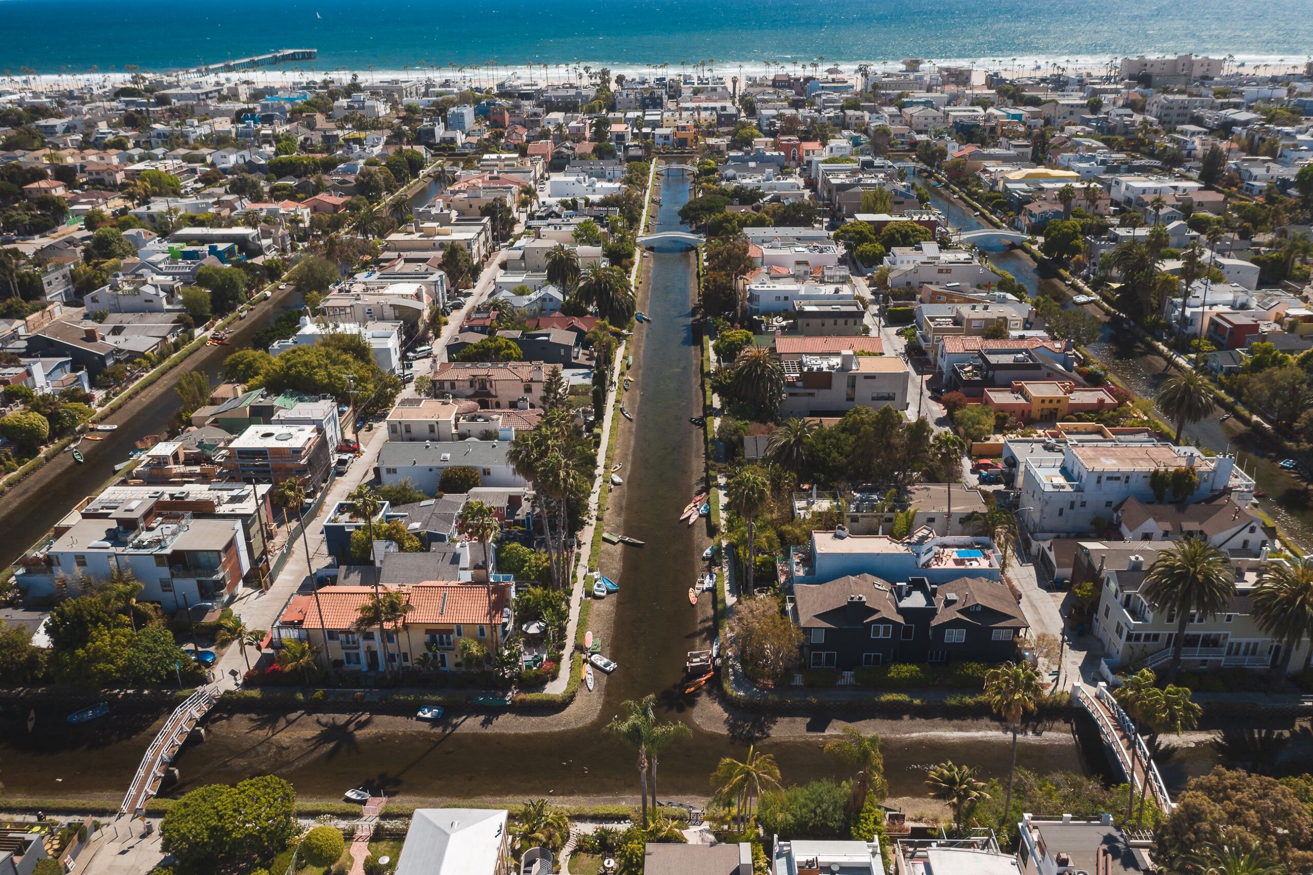 Walking the Venice Canals past homes and gardens in Venice, Los Angeles